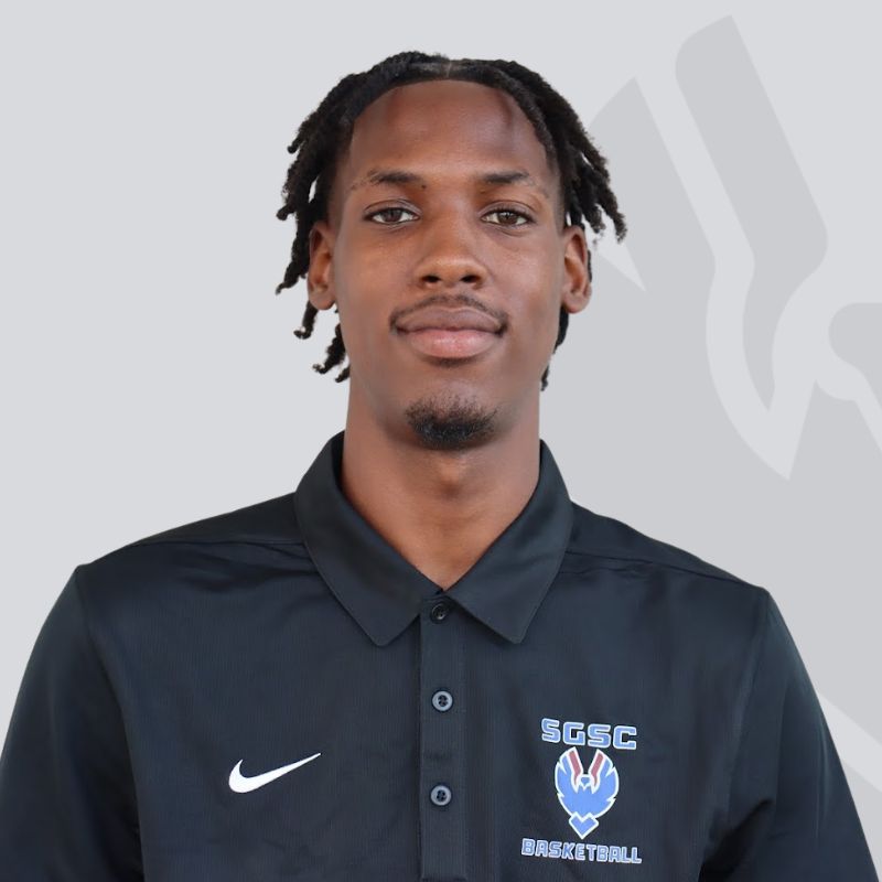 basketball player in Hawks shirt